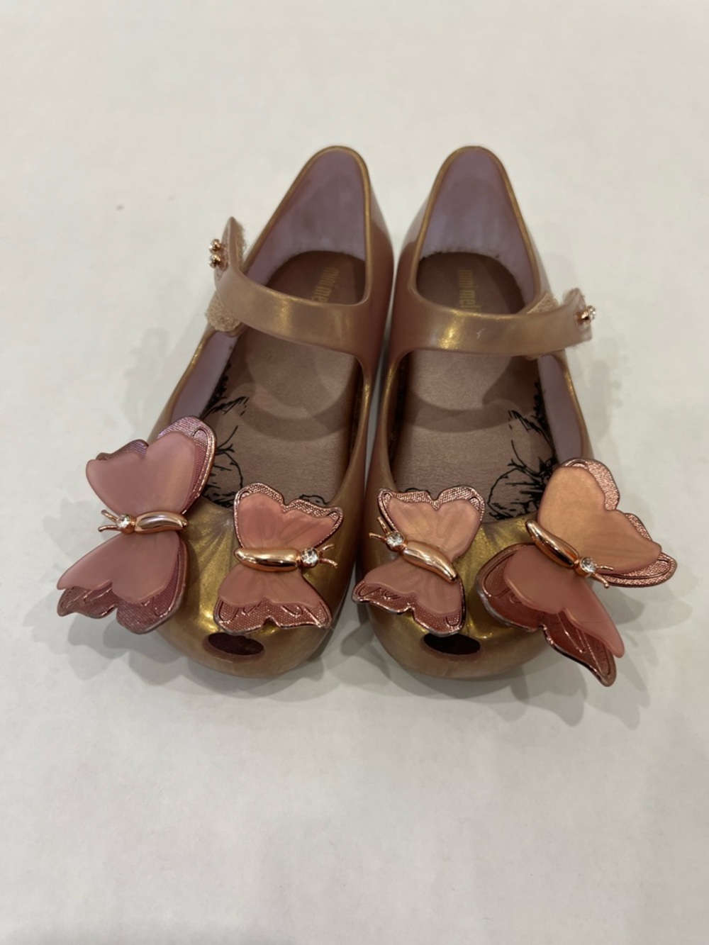 Mini Melissa Rose Gold Metallic Mary Janes with Pink Butterfly Accents